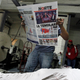 A worker reads a freshly printed newspaper with the headline reading "We will tremble" at a printer of the local daily Norte in Ciudad Juarez, Mexico, November 9, 2016.